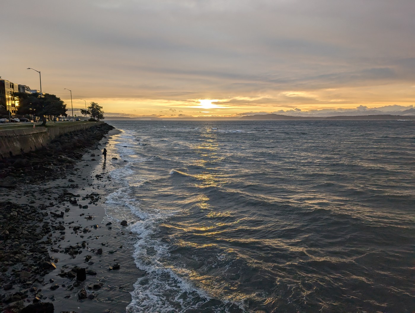 Sunrise over a coastal walking path in Alkimos